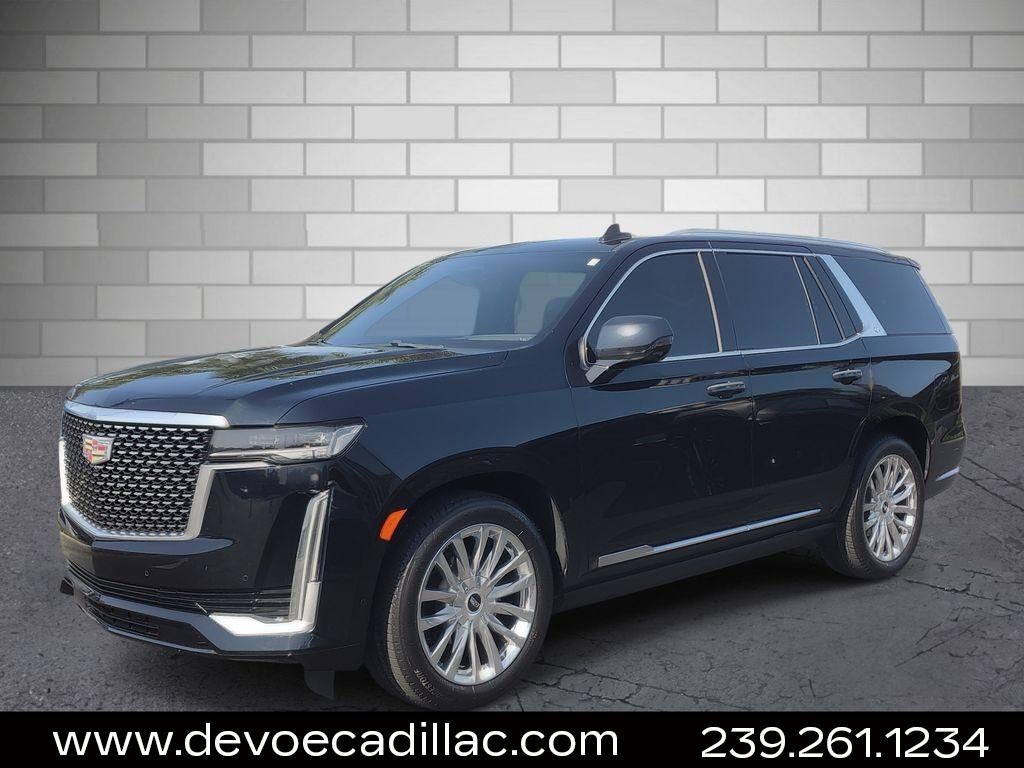 2021 Cadillac Escalade Premium Luxury in Dark Moon Blue Metallic — front three-quarter view