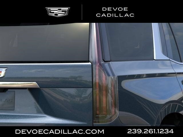 2026 Cadillac Escalade Luxury in Deep Sea Metallic — front three-quarter view