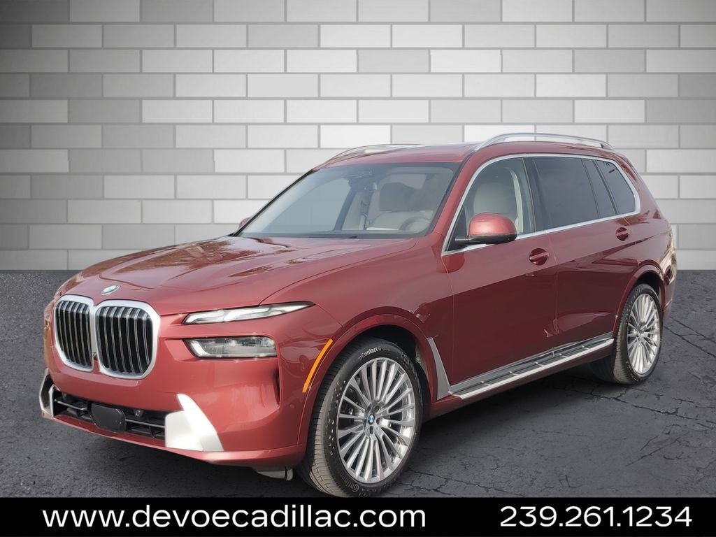 2024 BMW X7 xDrive40i in Aventurin Red Metallic — front three-quarter view